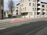 Gemarkeerd met een rode slemlaag,