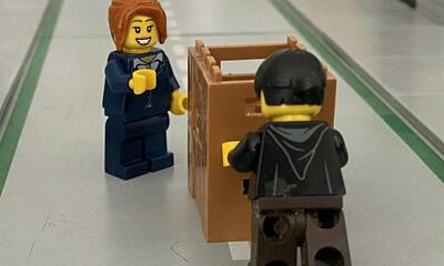 op de lange baan schuiven lego